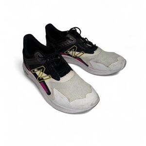 New Balance Black and White Sneakers with Pink and Yellow Accents